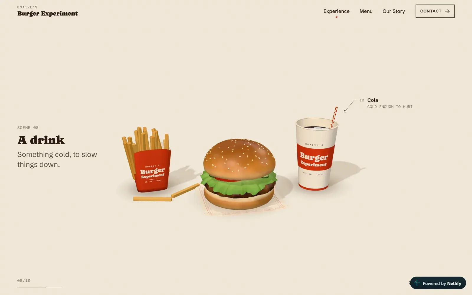 The finished burger beside fries and a cola